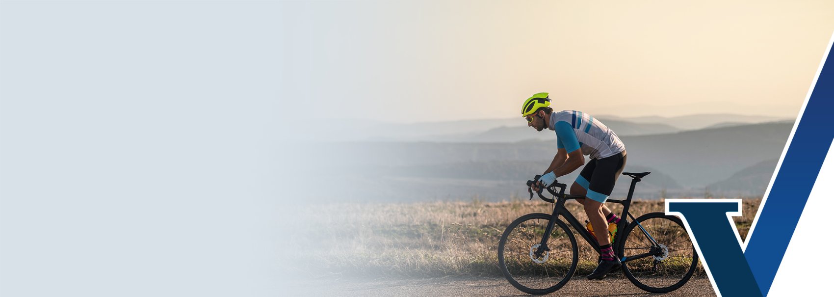 Man riding a bike at sunset in the desert