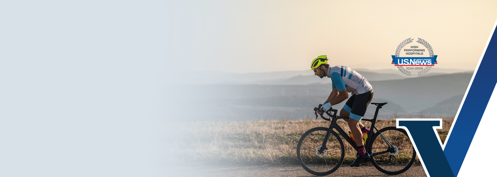Man riding a bike at sunset in the desert